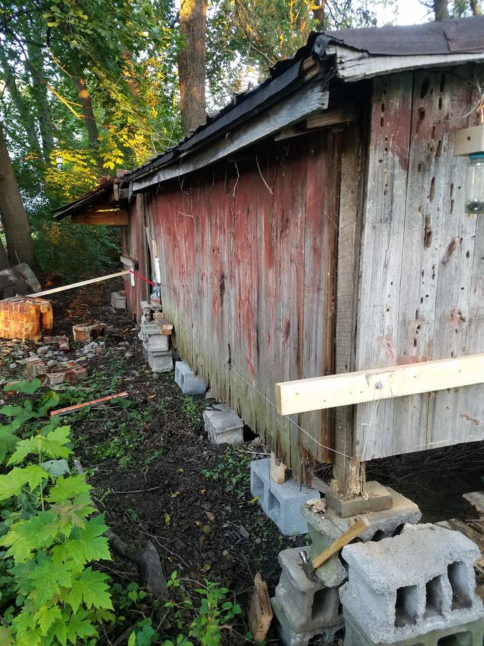 To-be-cut back wall, string in place for marking the cutting path.