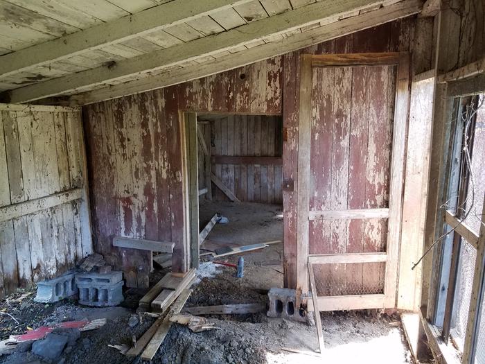 Original floor in-tact, but partially-rotten due to water intrusion