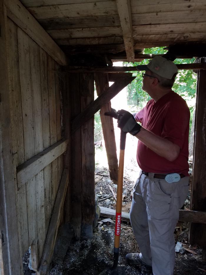 Dad helping out. That little anti-mosquito thing on his hip did a nice job in the confined space of the coop. No bites, no spray, good day.