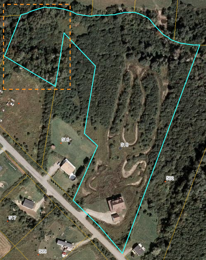 Wooded land marked with red border. All the rest has been cleared by previous owner (this is an older aerial image)