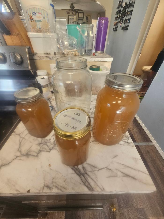 filling ginger beer jars for the second, fizz-making ferment