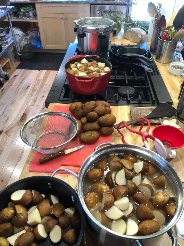 Potatoes in various stages of prep. 