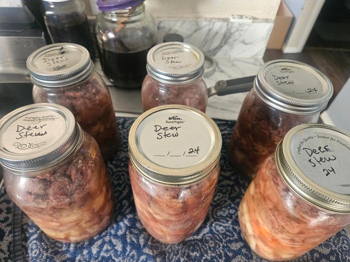 6 quarts jars of stew, sealed, labeled