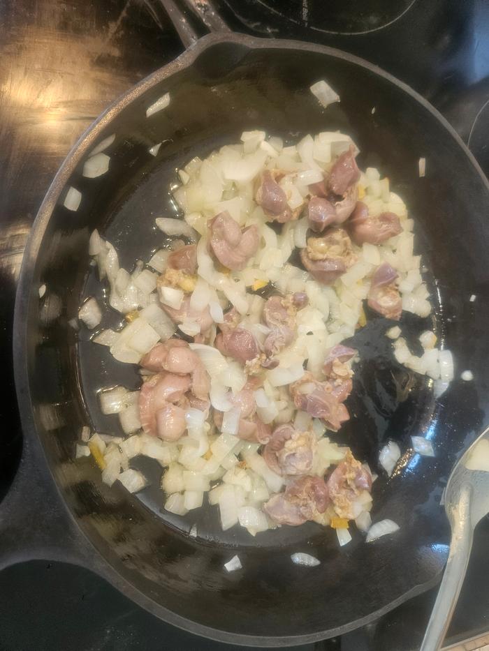 Frying gizzards with onions