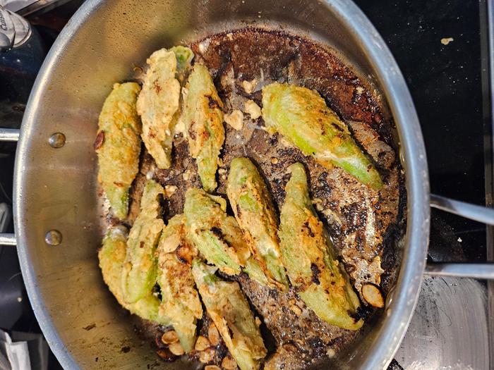 Frying pods. Battered with flour and egg wash