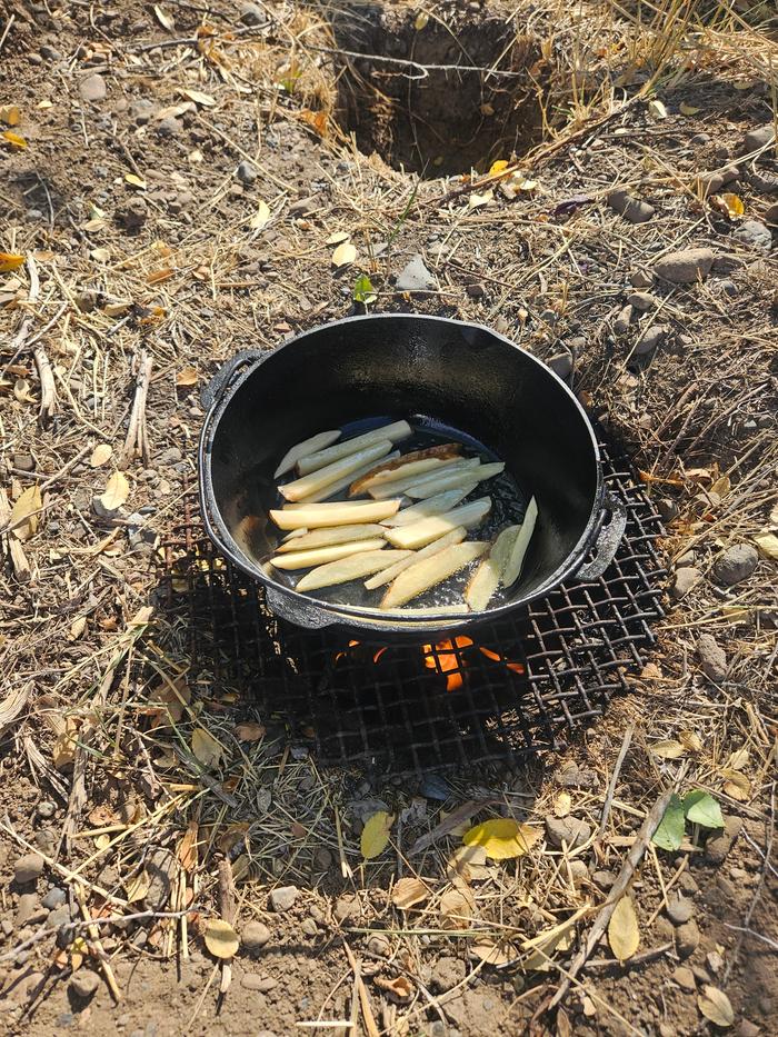 Frying spuds slivers in cast iron and lard, over my Dakota stove. Sizzle sizzle