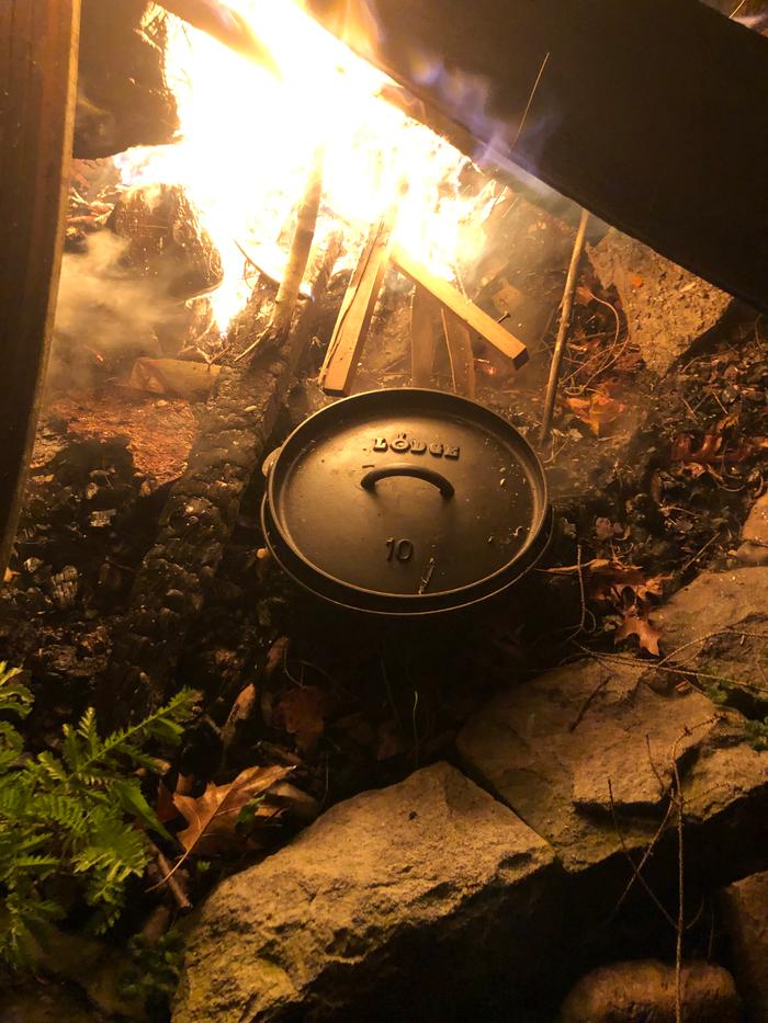 Even before the fire is cooking-ready, the Dutch oven is heating up. 