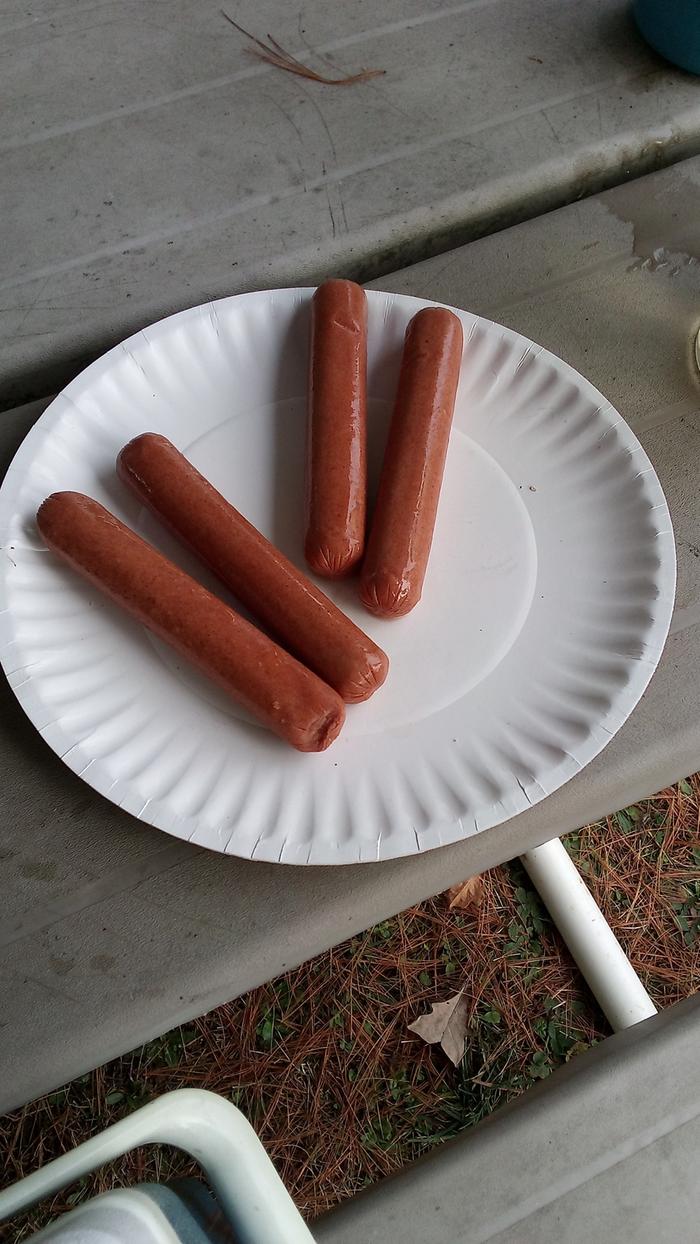 Preparing hot dogs for cooking :)