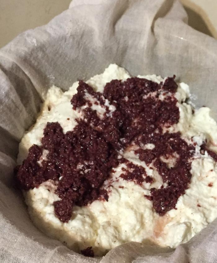 Curd and mix-ins in the colander.