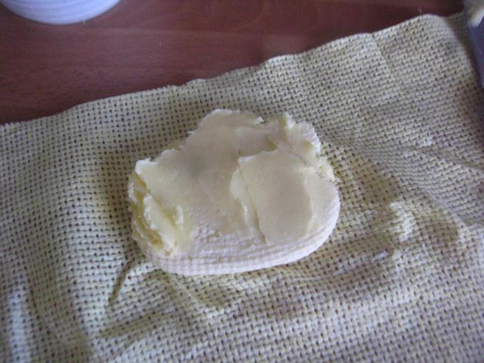 Layering in butter prior to maturation.