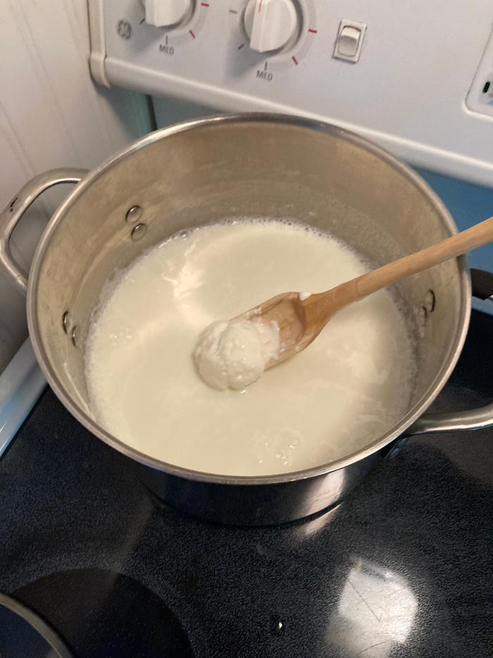 Mixing in the yogurt starter