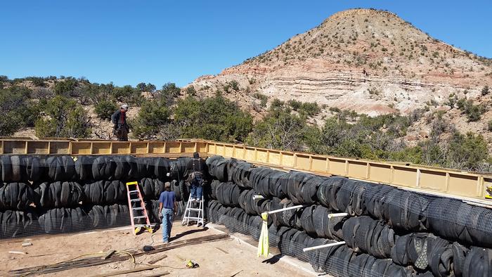 Bond beam forms on the top of the tire bale walls