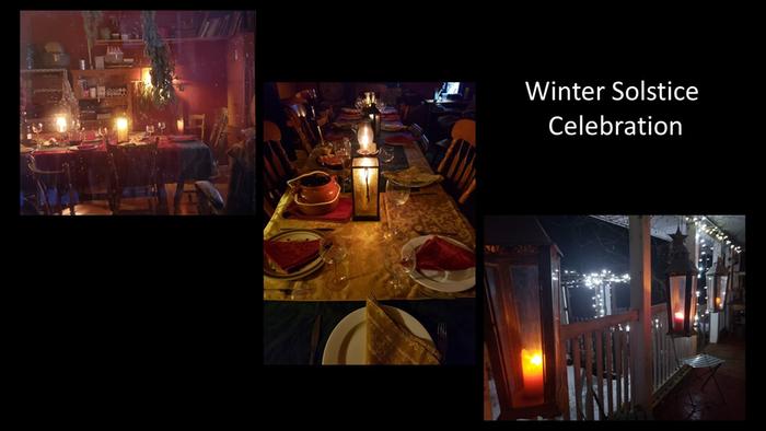 a winter solstice celebration featuring many candles at a set table