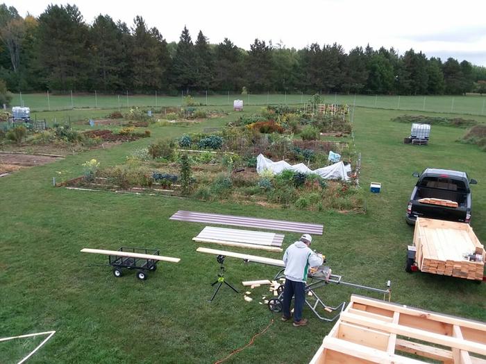 Boards at the garden getting cut to length