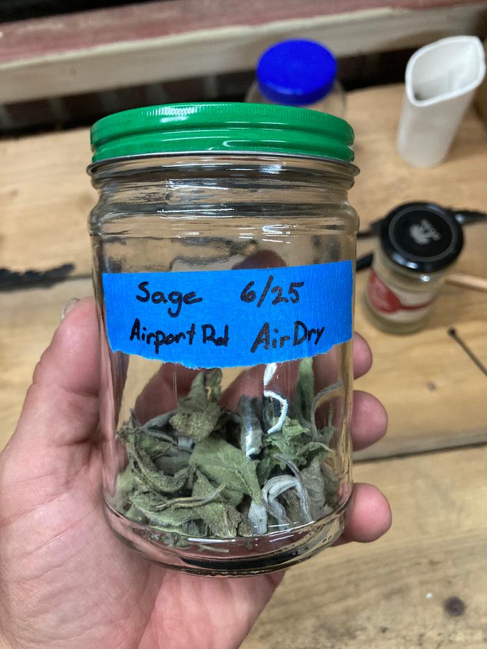 Dried sage in sealed labeled conditioner