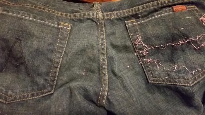 One pocket done, and the other has all the back stitches removed and just the front threads to cut