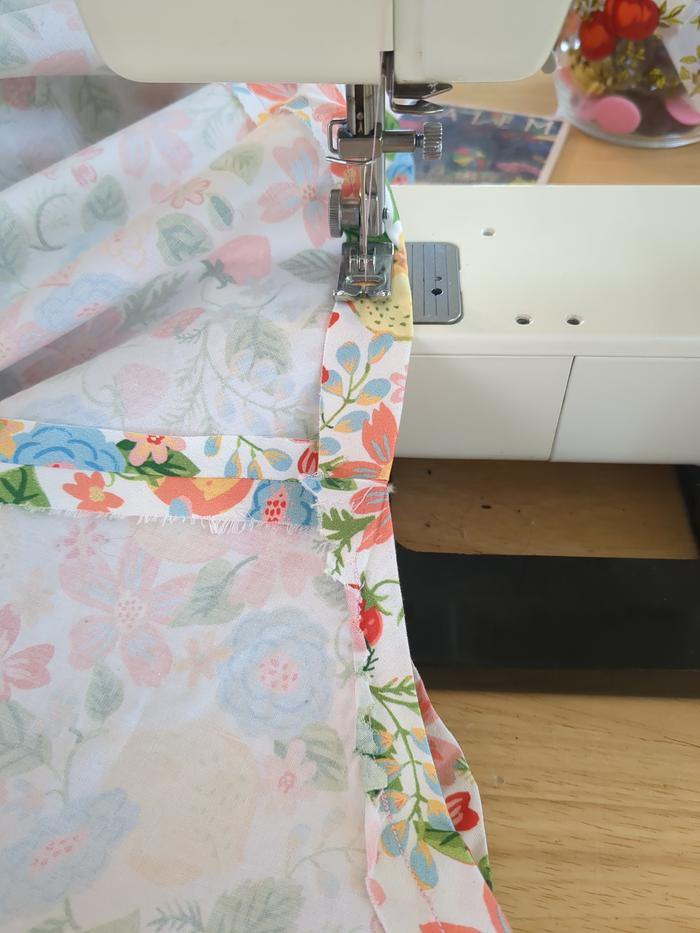 Sewing the hem.