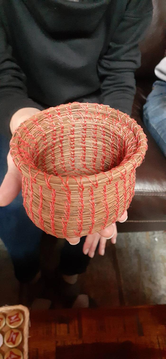 basket made with thread and pine needles