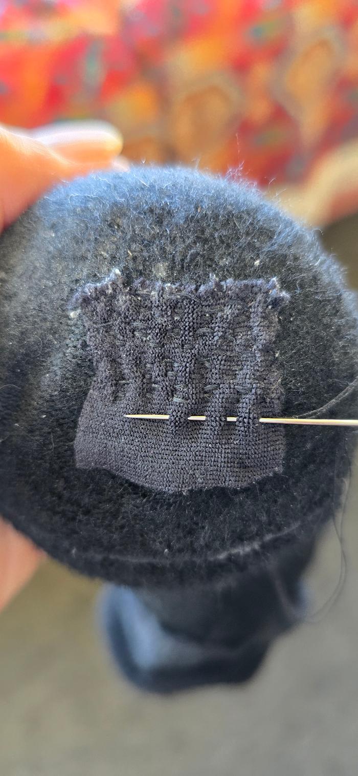 Hole in the toe of a sock