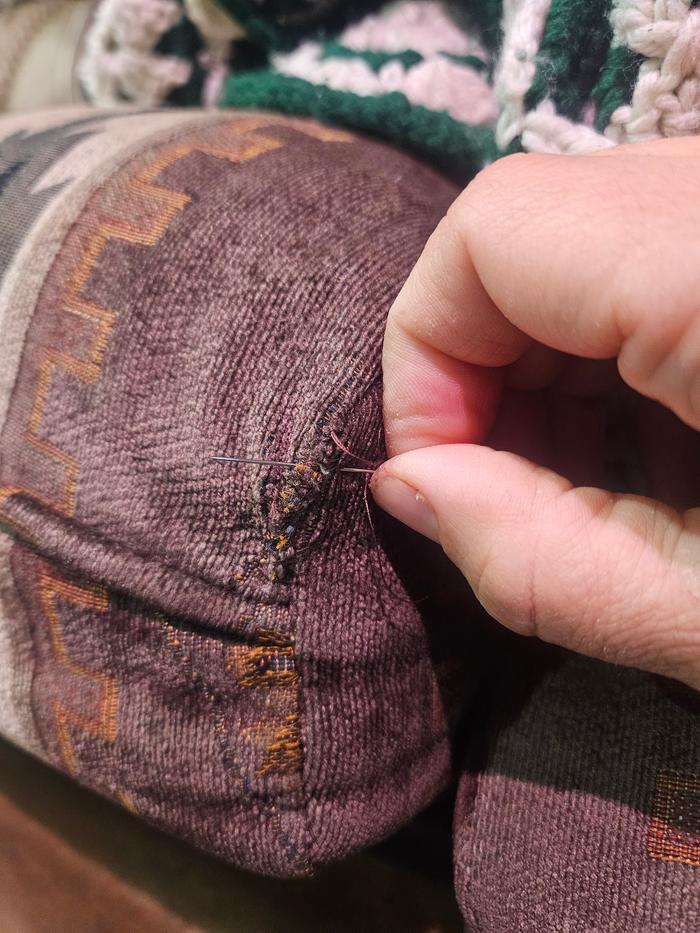 Me sewing a second round over the first for good, sturdy reinforcement