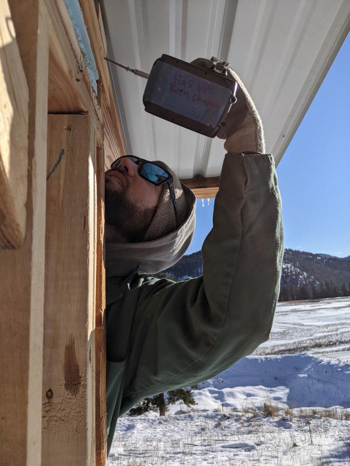 Josiah screwing in supports