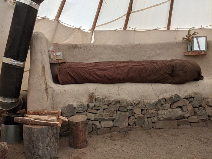 cozy bed inside RMH tipi