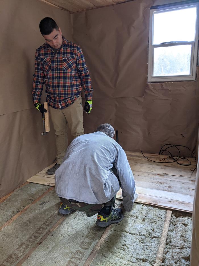 Daniel and Ed began installing the new flooring! 