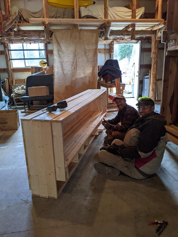 Dez and pals assembled this new shelf for the shop