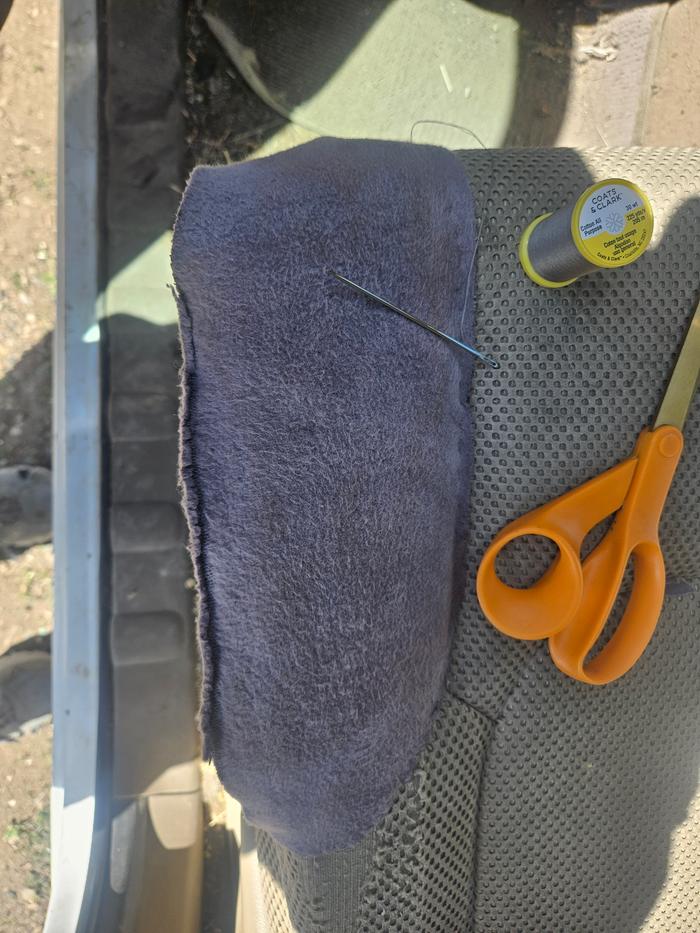 The materials used: wool felt, thread, scissors, a needle