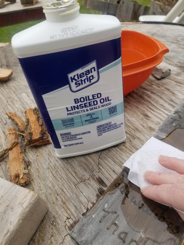 oiling the signs 