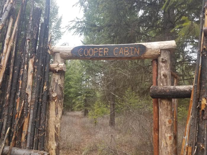 woodburned sign saying Cooper Cabin