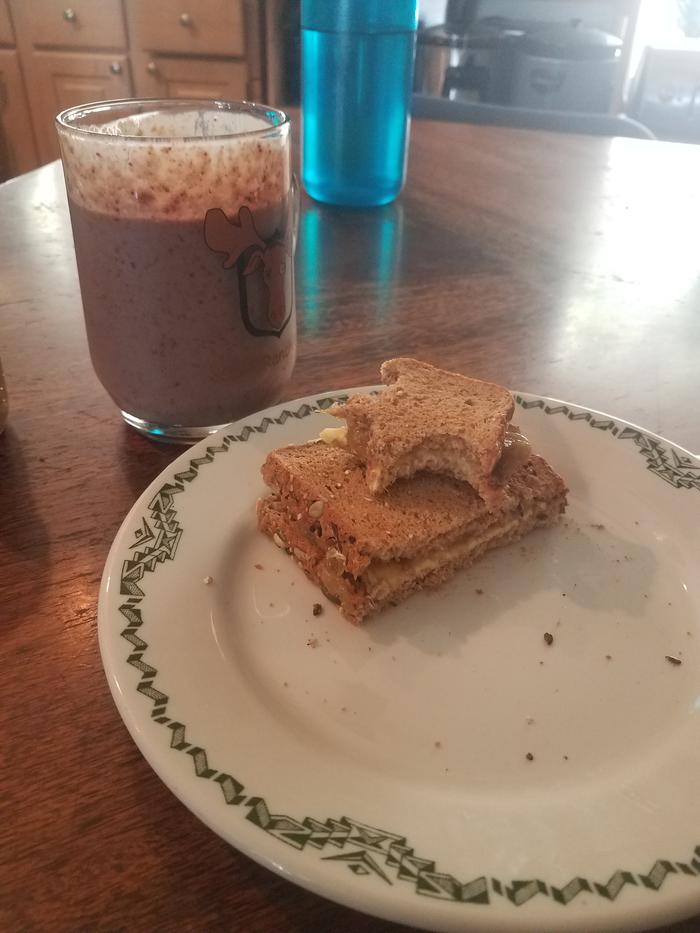 Smoothie (Blackberry, Banana, Greens, Yogurt, 2 Eggs, Lemon Juice, Cinnamon, and Ginger) and Toast with Rhubarb Jam with Butter