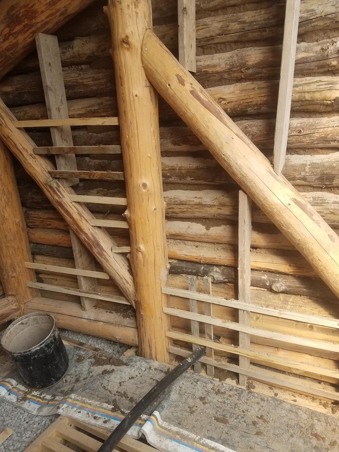 Matt cobbed this side too, some strips of wood to hold insulation in place