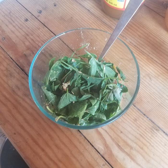 A simple salad with mustard and vinegar dressing. 