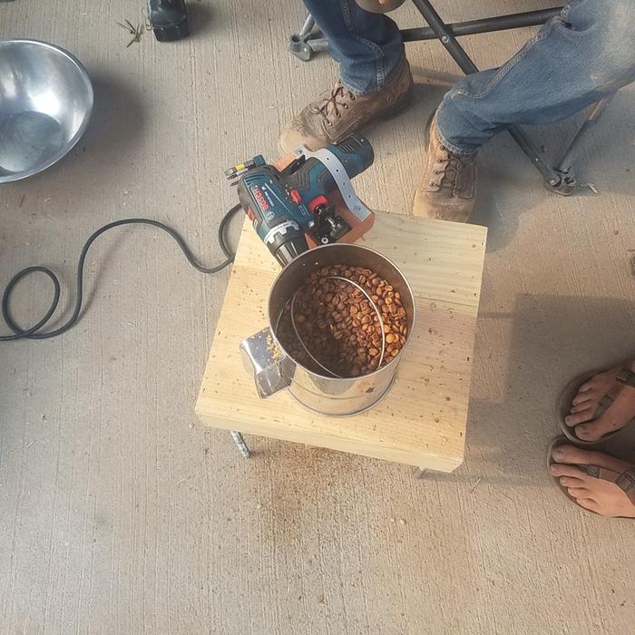 The platform has a hole with a heat gun aim upwards below it.