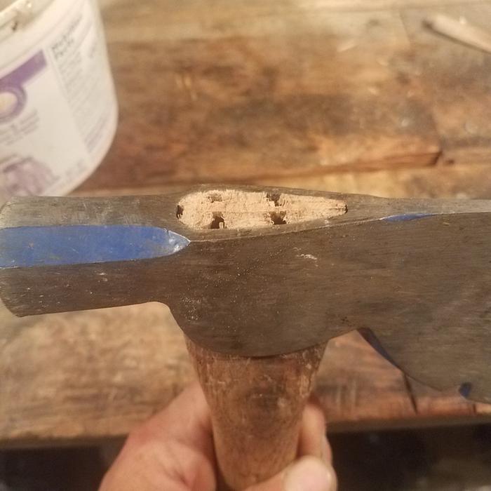 This is before putting the two metal wedges back