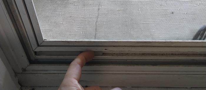 screen stuck, and there's glass in the same track above it