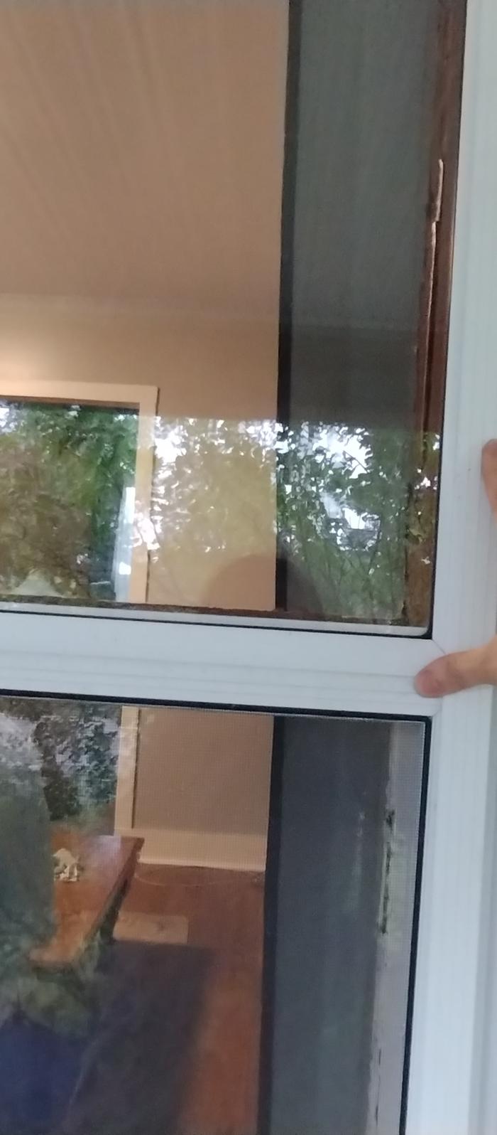 reinstalling storm window