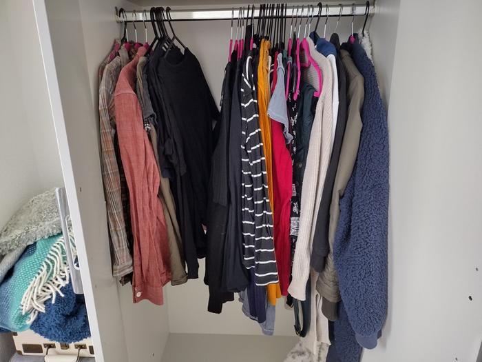 To make it easier to find the clothes I need, I've hung them in order of seasons and types of clothes. I realised how much of my wardrobe is black clothes while doing this! (I work in the theatre industry so it's like my uniform)