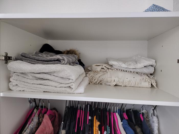I moved my blankets to the top of the wardrobe. There's space for my spare bedsheets which are air drying here too