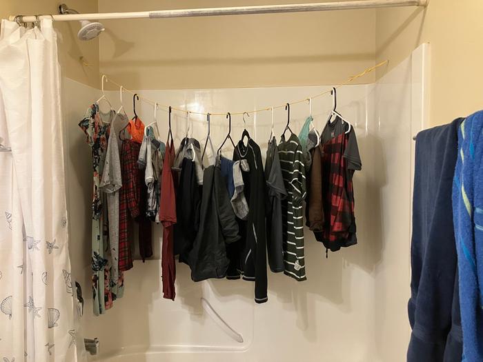 Hung up and working. Although, in the future I may only use it to dry small thing a like socks and underwear. The cord is straining here.