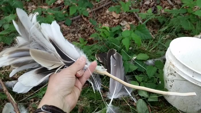 I wrapped 3 or 4 feathers in a clump at a time, much like making a broom