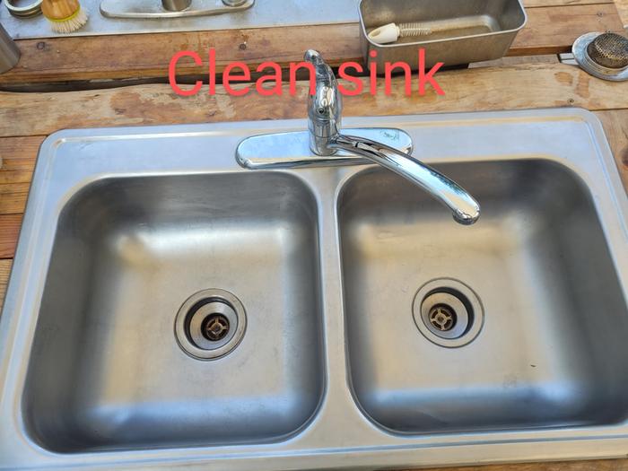 I used a cotton towel to dry and polish the sink - it worked well!