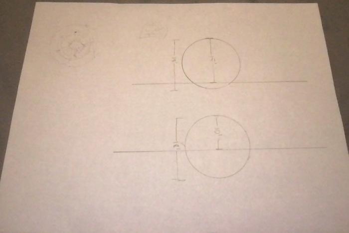 18' diameter sphere- top is 3' below grade, bottom is 8' below grade