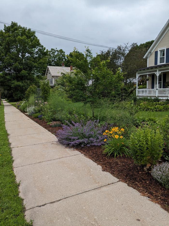 long view of sidewalk looking west