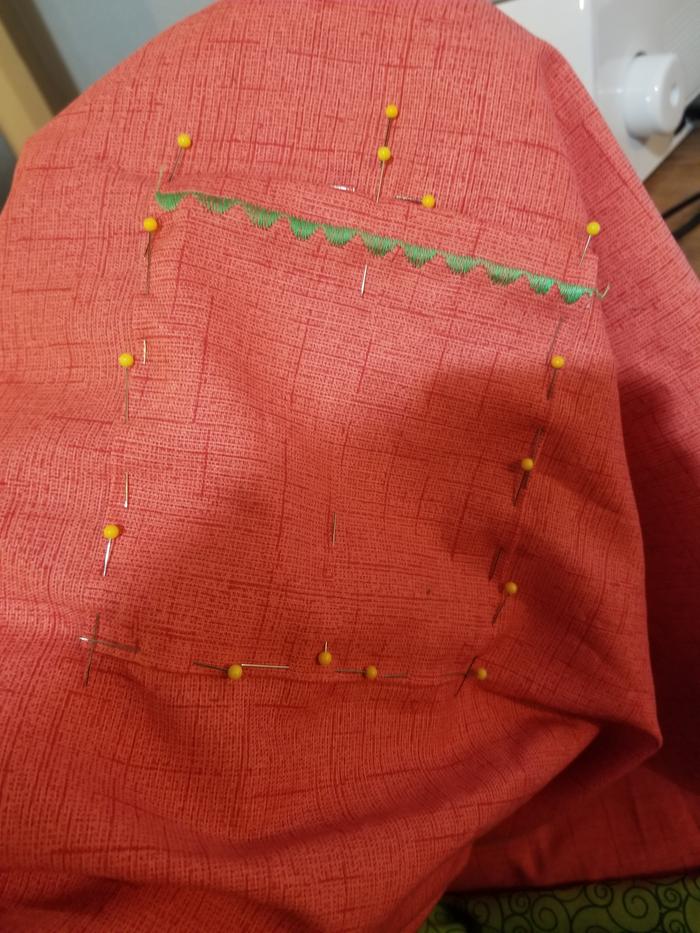 pinning the pocket on the main fabric- struggled to get it straight...