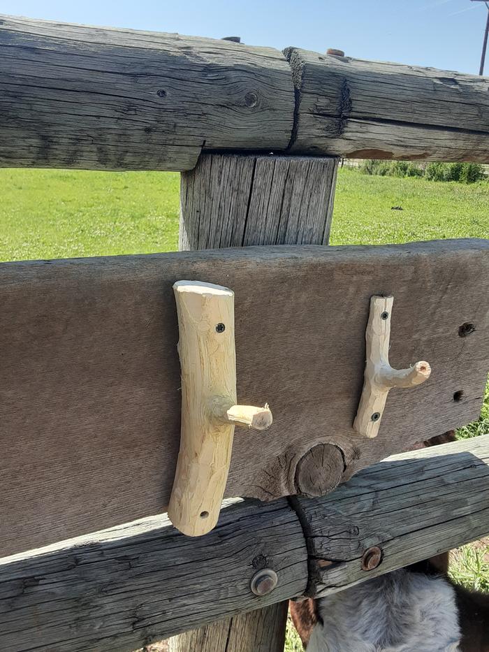 Finished hooks mounted on wood 