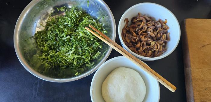 Cabbage, shitake mushrooms and dough for dumplings