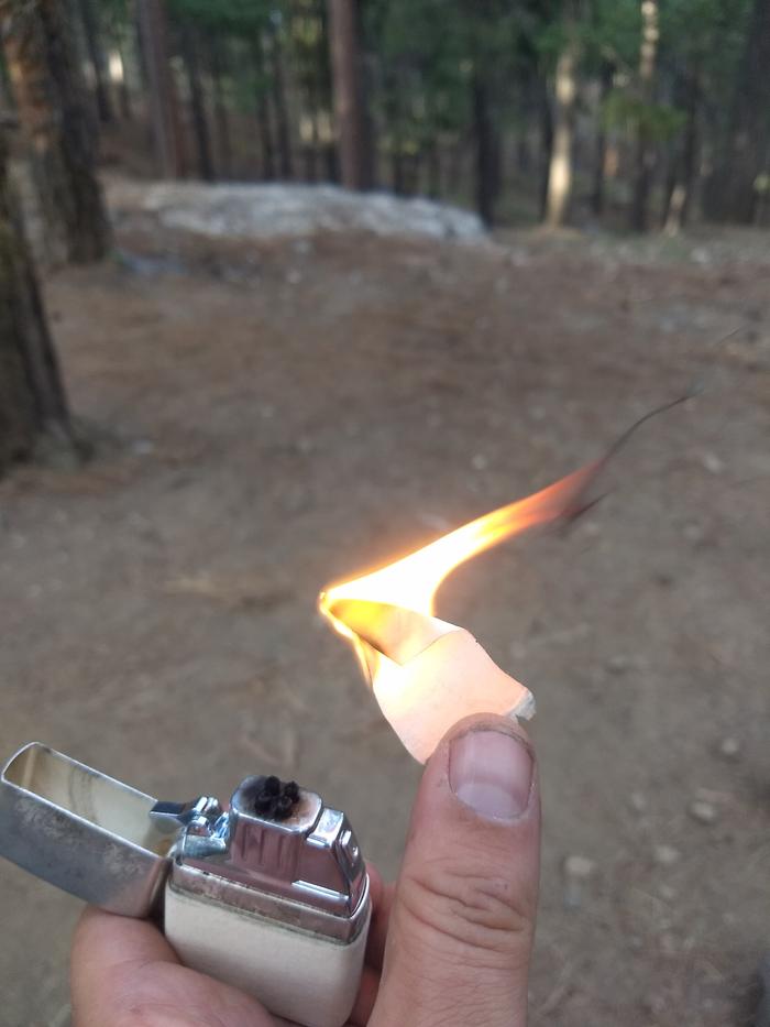 Masking tape lit by a plasma lighter