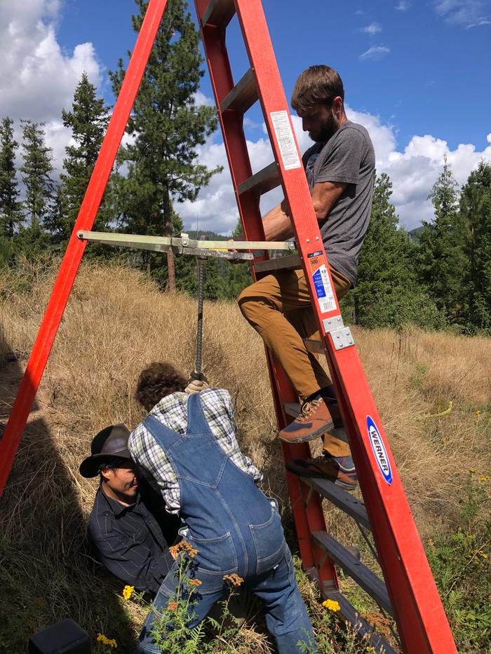 How many men does it take to hammer in a rebar spike?